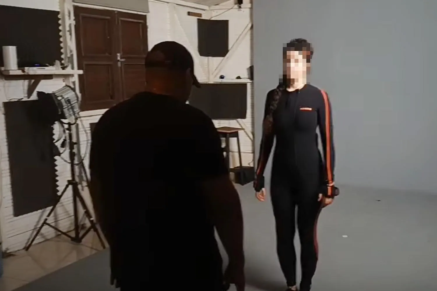 Preparing a capture session in the studio, one person in a motion capture suit
